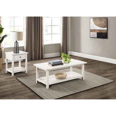 Table basse et d'appoint blanche vieillie, structure en placage de pin, forme rectangulaire, tiroir et tablette de rangement, idéale pour les salons modernes. Style rustique en deux parties, bois, étagères.