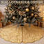 Jupe de sapin de Noël en velours doré, bord festonné élégant, décoration luxueuse pour le pied du sapin.