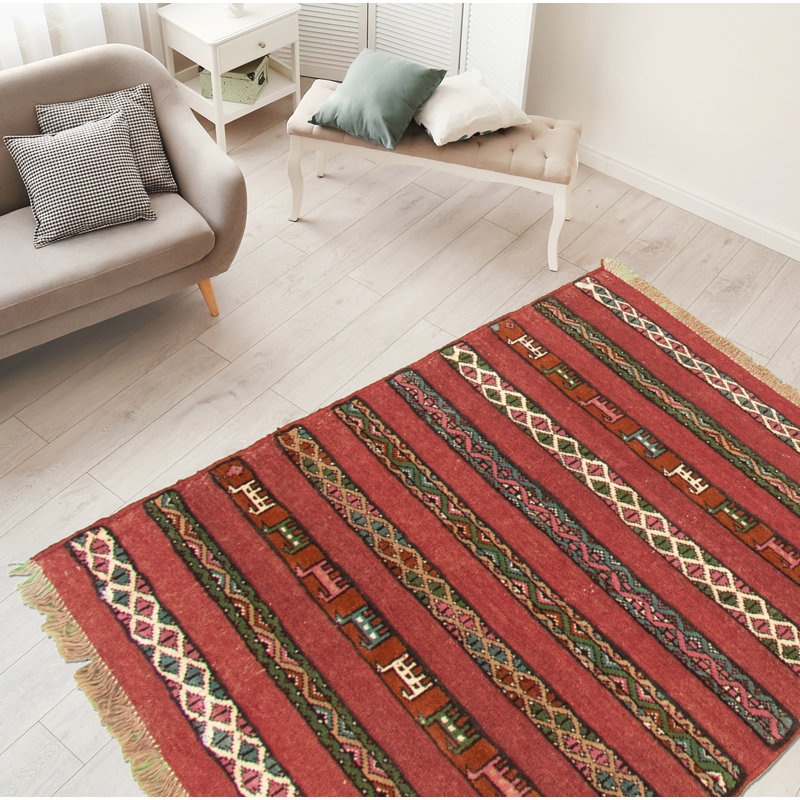 Tapis rouge foncé en laine noué à la main