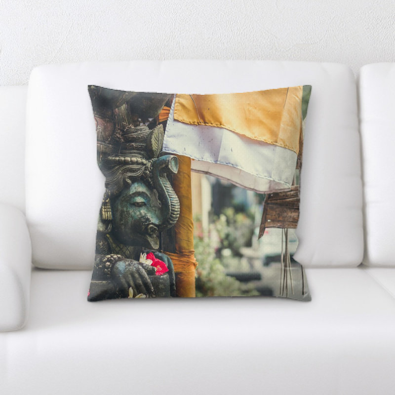 Coussin statue