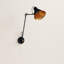 Tutuala Swing Arm Sconce-25387738