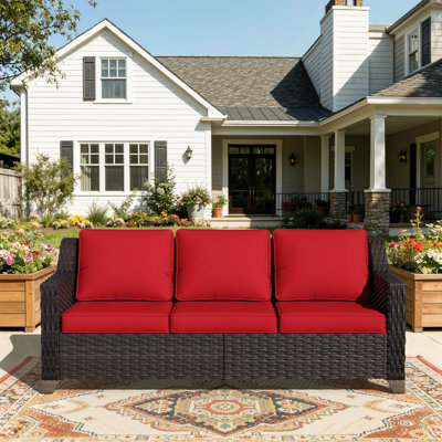Rivendell 76.77" Wide Outdoor Wicker Patio Sofa with Cushions