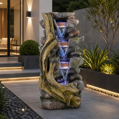 Fontaine d'extérieur en résine de 65 cm de haut avec DEL bleues, cascade à 4 niveaux de pierres et de bois flotté, décoration autoportante pour jardin, terrasse, pelouse ou intérieur.