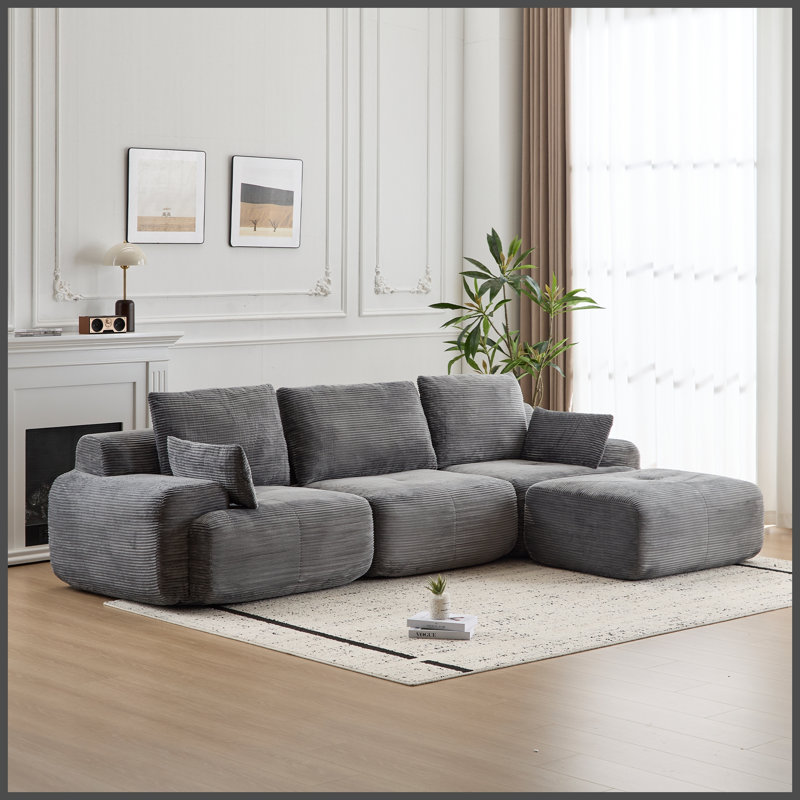 Canapé d'angle modulaire Cloud en velours côtelé gris moderne, en forme de L, avec assise extra profonde et rembourrage surdimensionné en mousse à mémoire de forme compressée, canapé doux et adapté aux animaux domestiques avec pouf pour grand salon ou appartement au sous-sol.