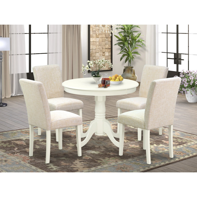 L'ensemble de table de salle à manger 5 pièces pour 4 personnes comprend une table de cuisine ronde avec piédestal et 4 chaises rembourrées en tissu de lin beige clair, lin blanc