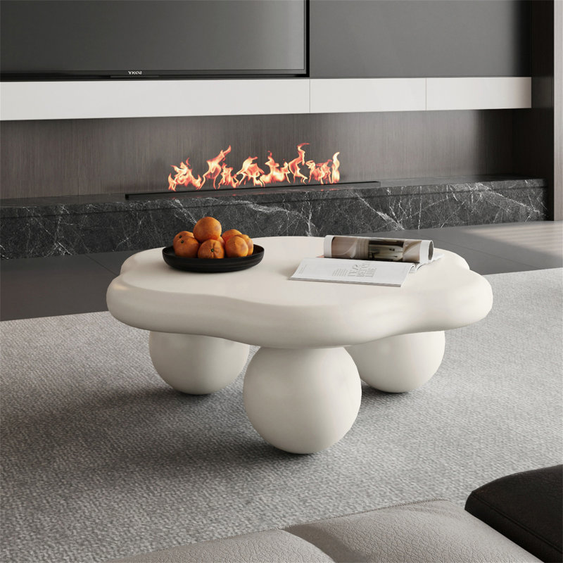 Table basse de 35 pouces en forme de nuage avec pieds arrondis, idéale pour un décor moderne et minimaliste, sécuritaire pour les enfants et les animaux domestiques.