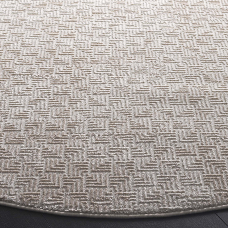 Tapis géométrique tissé à la machine en taupe / beige Alnitak, Rond 6 pi 7 po
