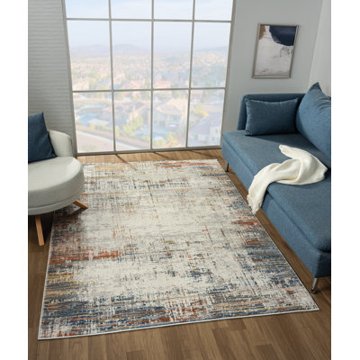 Tapis multicolore abstrait coups de pinceau bleu, rouille et ivoire