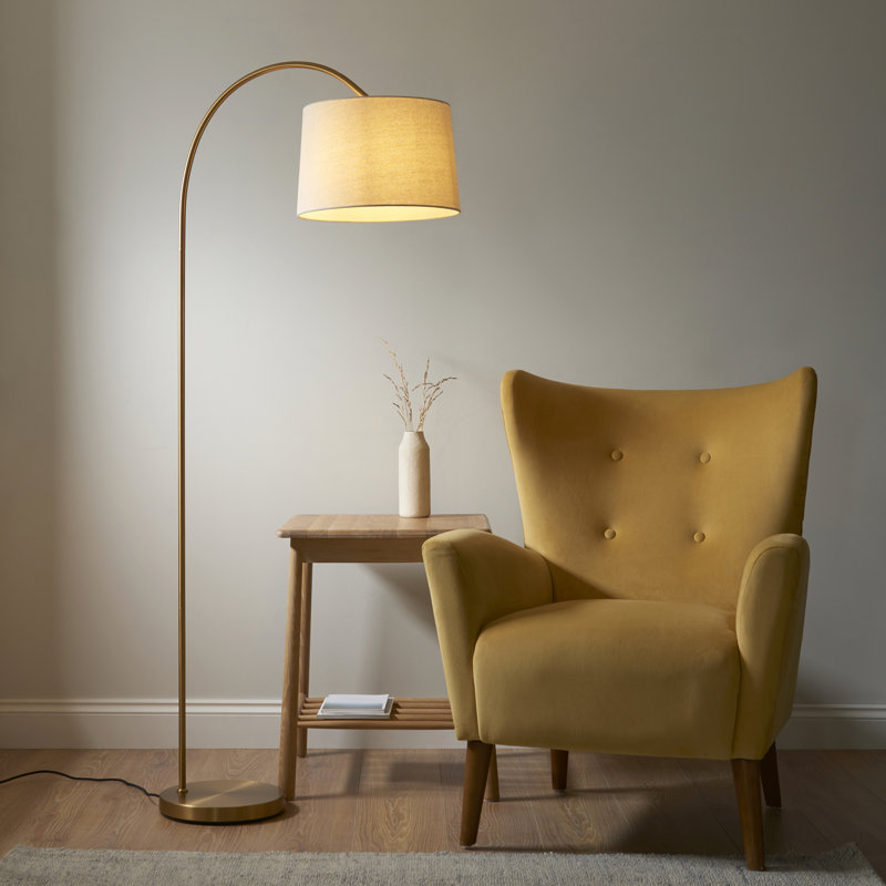 Thackinh Floor Lamp finished in Warm Brass and Cream