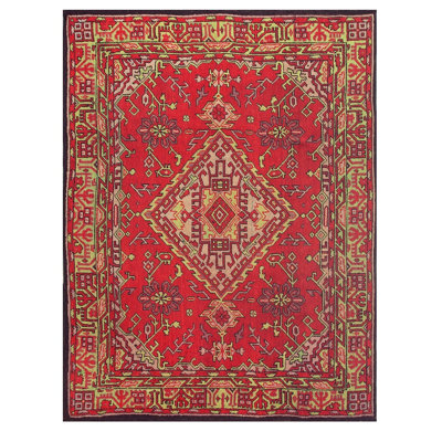 Tapis ancien européen Donegal Arts & Crafts des années 1920, à décor rouge vif et médaillon. Dimensions : 213 x 305 cm.