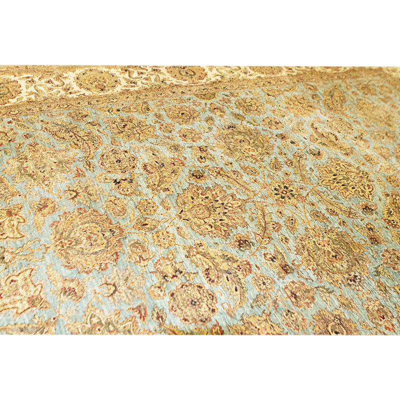 Tapis bleu et ivoire de haute qualité noué à la main