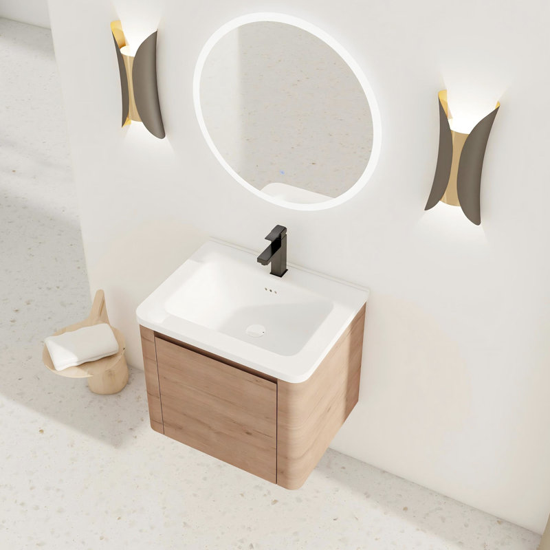 Meuble-lavabo moderne de 24 po avec lavabo en céramique blanc, porte à fermeture en douceur et surface pour un entretien facile.