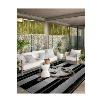 Tapis noir lavable à motif tissé noir
