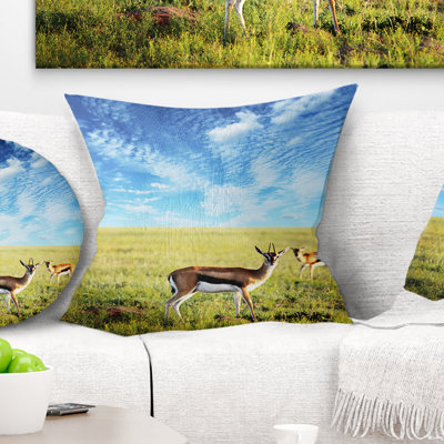 African Antelopes Wandering Under Bright Sky Pillow