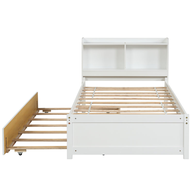 Élégant lit simple avec lit gigogne et bibliothèque en blanc - Compartiments de rangement attrayants pour chambre à coucher