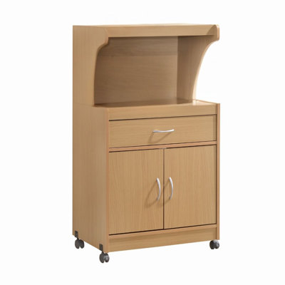 Rolling Kitchen Cart with Microwave Shelf, Utensil Drawer, Interior Cabinet Storage Space and Locking Wheels by L