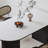 Oval-shaped light luxury black dining table-6174631