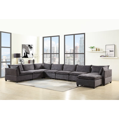 Delpha Upholstered U-Shaped Sectional with Ottoman Reversible