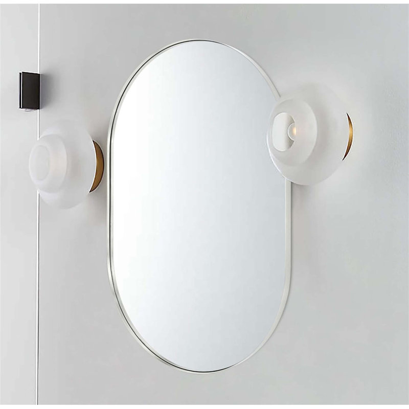 Miroir mural ovale en métal avec verre de haute qualité et caractéristiques incassables, idéal pour les pièces modernes et contemporaines