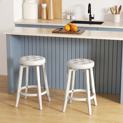 Nickolette Swivel Upholstered Counter Stool with Solid Wood Frame