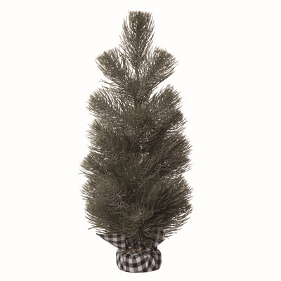 Arbre de Noël vert avec lumières et baies
