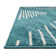 Tapis bleu à motif géométrique