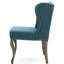 Fauteuil à oreilles bleu sarcelle avec garniture cloutée et boutons
