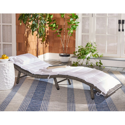 Laterrian Outdoor Wicker Chaise Lounge , Cushion Included