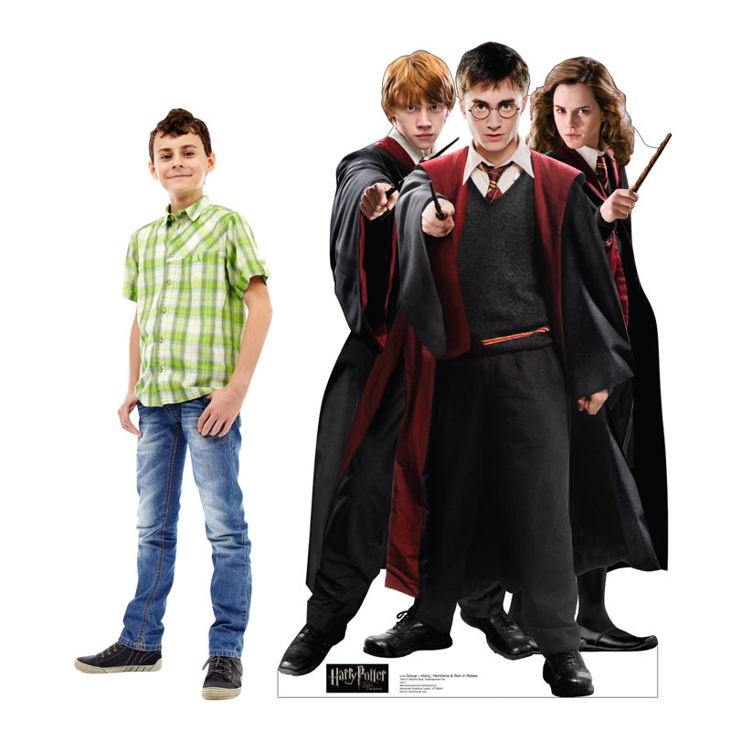 «Harry, Hermione et Ron en robe debout»