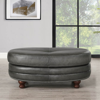 Repose-pieds ovale en cuir fleur
