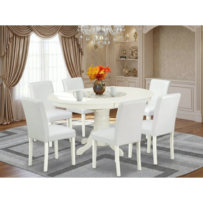 7 Piece Dining Room Furniture Set consists of an Oval Wooden Table with Butterfly Leaf and 6 White Faux Leather Parson Dining Chairs, 42x60 Inch, Linen White