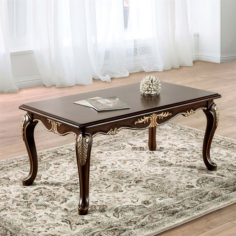 Table basse rectangulaire en bois massif de style traditionnel avec fini sculpté et pieds en cabriole