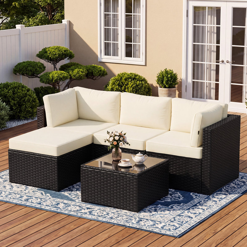 Canapé d'angle modulaire de 5 pièces en résine tressée pour terrasse, avec pouf et coussins, Beige