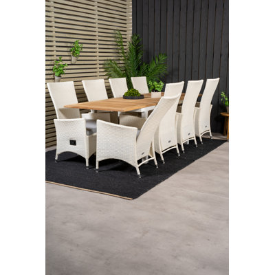 Navya 8 - Person Patio Dining Set with Extendable Rectangular Table , Cushions Included