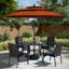 Ensemble de salle à manger de patio 6 pièces 4 fauteuils en rotin et table ronde en métal avec parasol-746054184