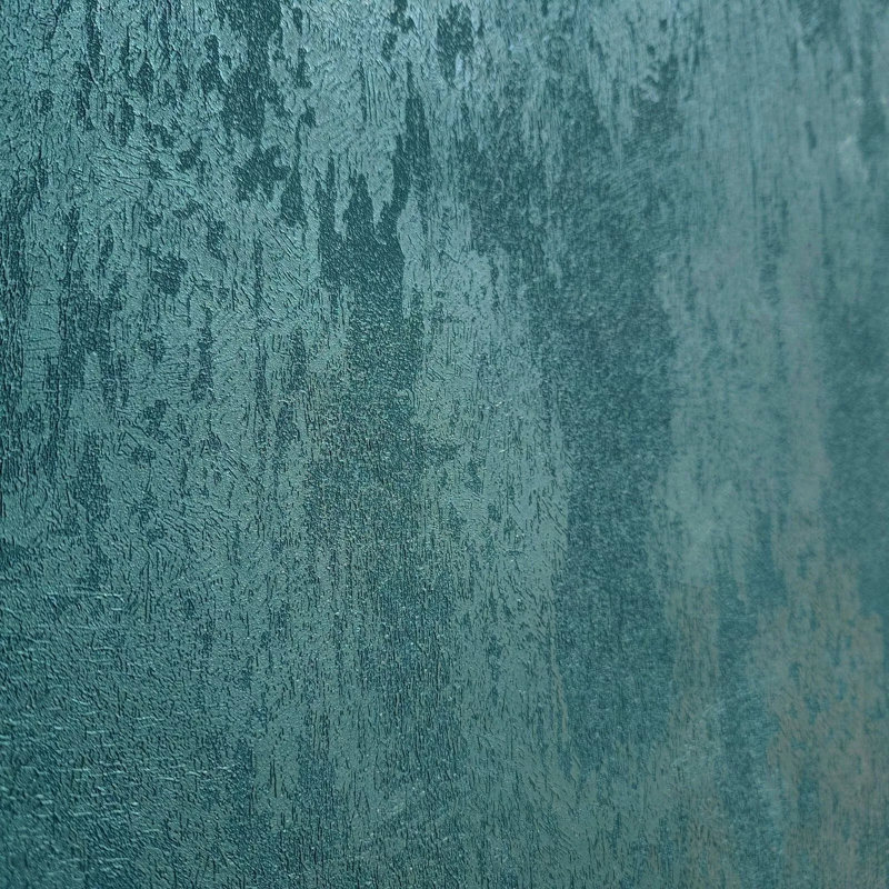 Papier peint texturé plâtre uni bleu sarcelle