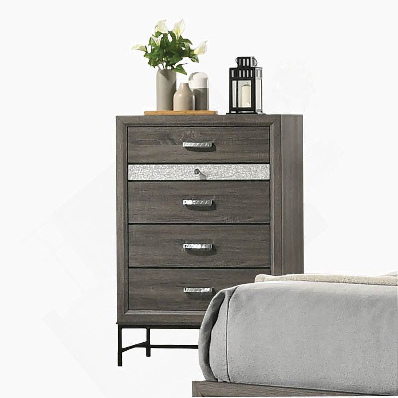 Commode de style contemporain à 4 tiroirs avec pieds en métal et poignées décoratives en acrylique