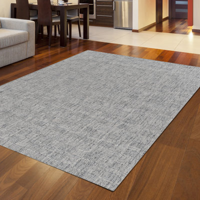 Tapis argenté / gris en laine tressé à la main Fraher