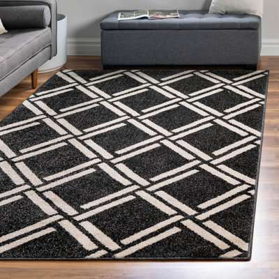 Tapis noir à motif géométrique Cand