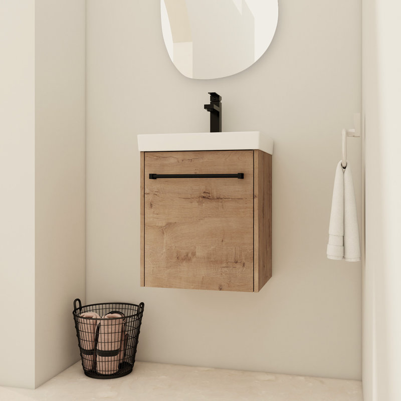 Meuble-lavabo de 18 po avec design flottant et lavabo en céramique, portes à fermeture douce pour petits espaces, robinet d'évier pré-percé à poignée simple, poignée en métal, meuble-lavabo moderne à base de contreplaqué, portes, trois couches