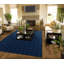 Tapis bleu touffeté à motif géométrique Thayer-1982839662