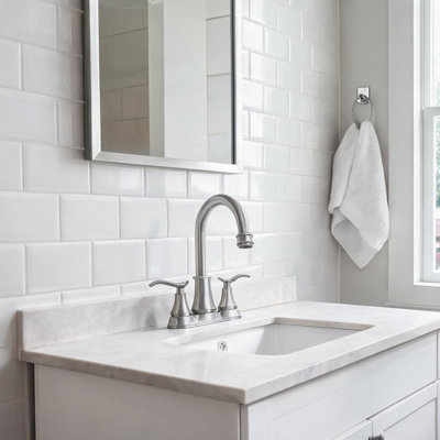 Brushed Nickel 4 in Bathroom Faucet with Swivel Spout, Pop-Up Drain and Two Handle Design