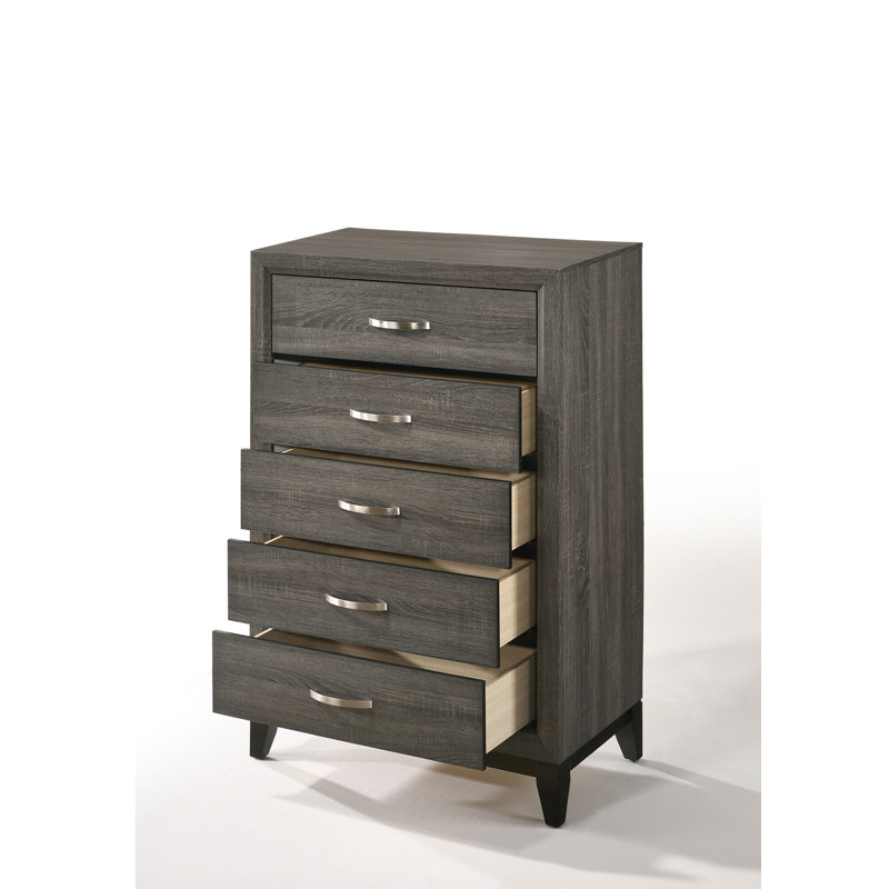 Commode vieillie Valdemar avec cinq tiroirs spacieux et des joints à queue d'aronde anglaise durables pour un rangement durable