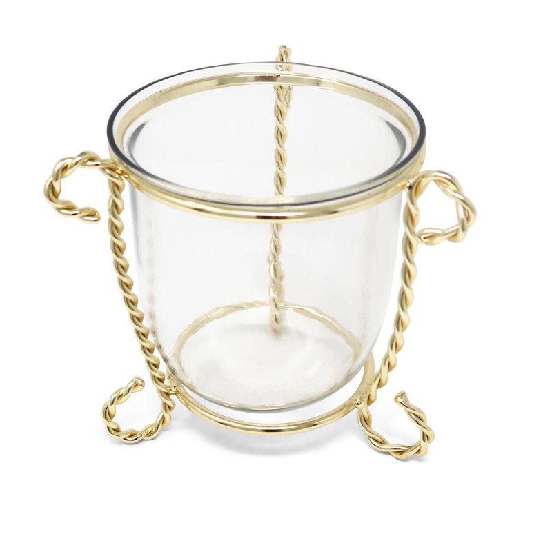 Porte-bougie en verre sur un support en laiton doré