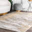 Tapis doré à motif abstrait Rosen-642199353