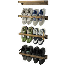 https://assets.wfcdn.com/im/29830689/resize-h210-w210%5Ecompr-r85/2611/261115693/Wall+Mounted+Burnt+Wood+Shoe+Rack+Storage+%28Set+of+4%29.jpg