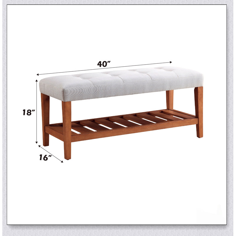 Le banc en tissu et en finition de chêne Charla, parfait pour les entrées et les salons, allie style et confort avec une fabrication durable.
