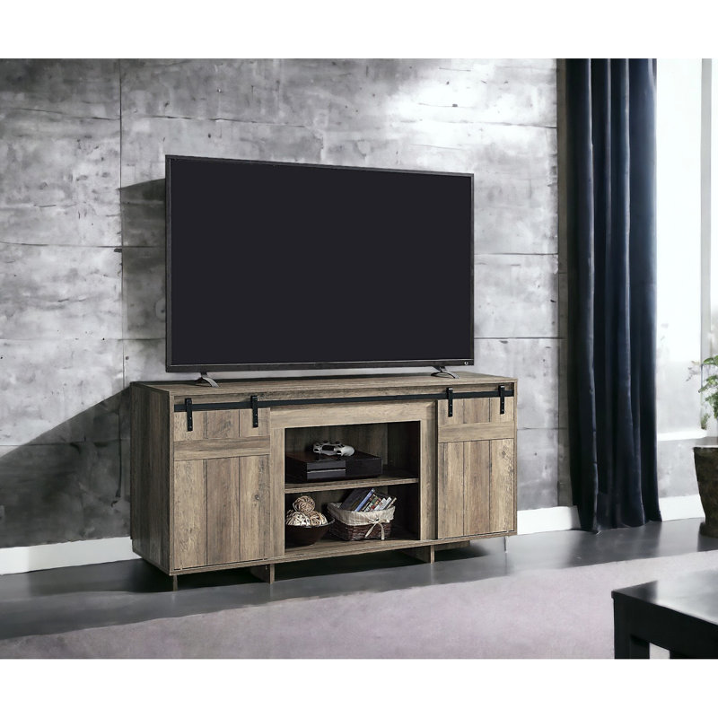 Meuble télé gris avec portes et tiroirs, pouvant accueillir des téléviseurs de 50 à 59 pouces, style rustique, bois composite, commode élégante à finition grise, porte de grange