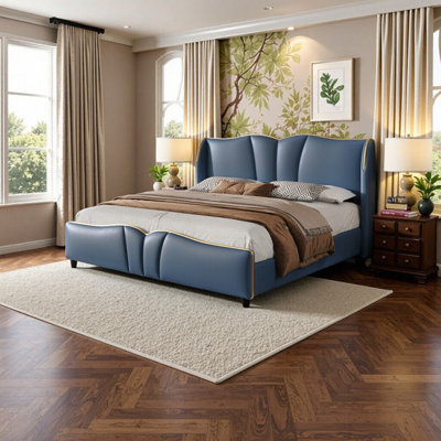 Élégante base de lit tapissier en cuir bleu antique avec tête de lit à oreilles et pied de lit ondulé - aucun sommier nécessaire