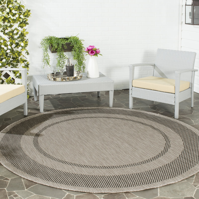 Reid Performance Solid Color Indoor/Outdoor Area Rug, Round 5'3", Beige/Black